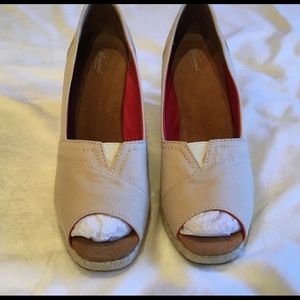 Woman’s peep toe wedge shoes